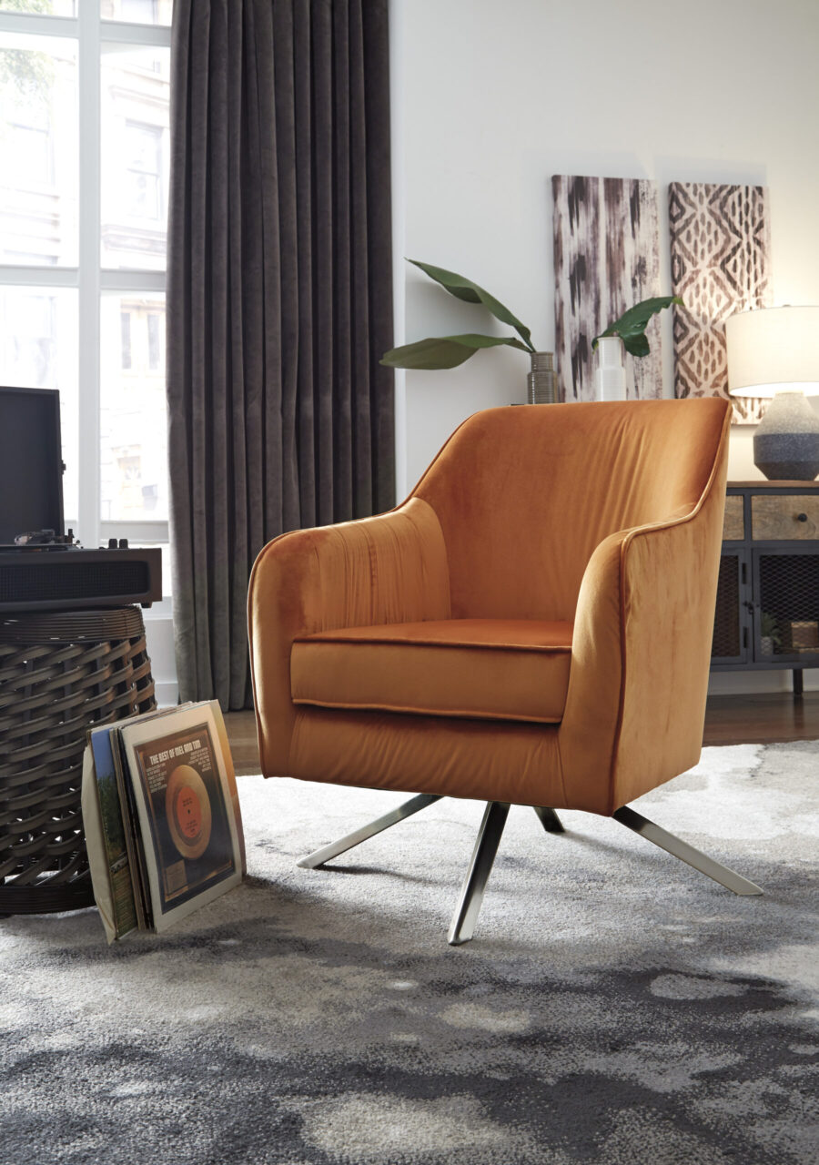 Ashley Hangar tugitool muudab kaasaegse stiili koduselt hubaseks. Tugitooli lineaarne raam on rikastatud imepehme pruunikaspunase sameti laadse polsterdusega. Õhukesed käetoed, modernsed jalad ja omanäolised õmblused on detailid, mis muudavad tooli eripäraseks.